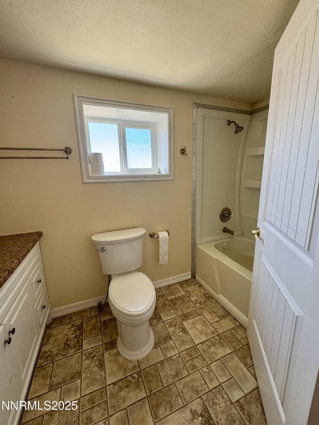 13995 Grass Valley Rd, Winnemucca, NV 89445 - full bath with baseboards, vanity, toilet, shower / bath combination, and a textured ceiling