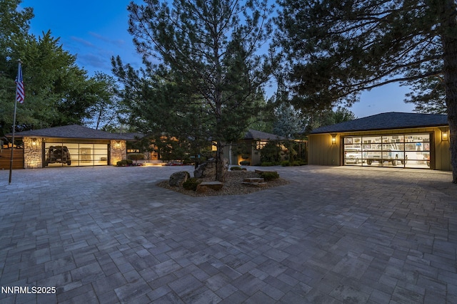 1180 Manzanita Ln, Reno, NV 89509 - view of front of house featuring an outbuilding, decorative driveway, and an attached garage