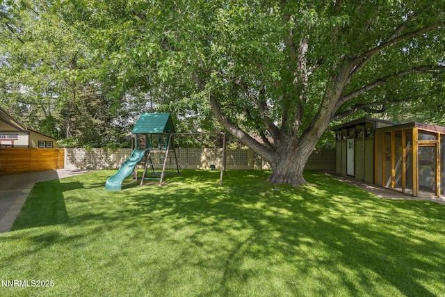 1180 Manzanita Ln, Reno, NV 89509 - view of yard with a playground and an outbuilding