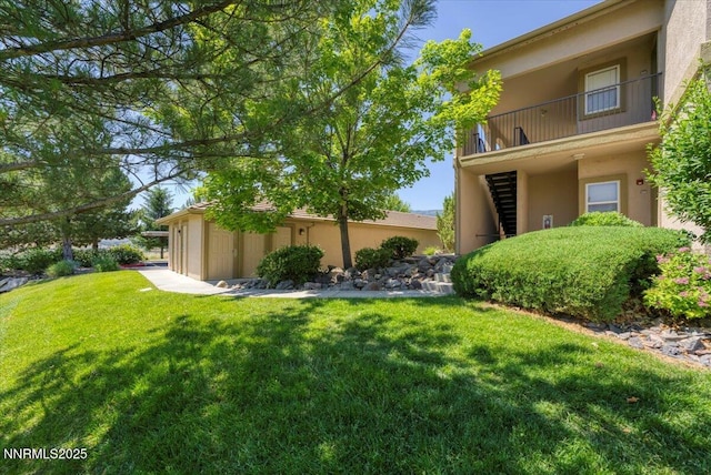 6850 Sharlands Ave Unit F2030, Reno, NV 89523 - view of grassy yard featuring a balcony