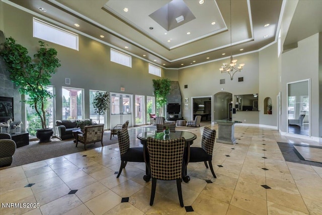 6850 Sharlands Ave Unit F2030, Reno, NV 89523 - dining room featuring a high ceiling, light tile patterned floors, recessed lighting, a chandelier, and plenty of natural light