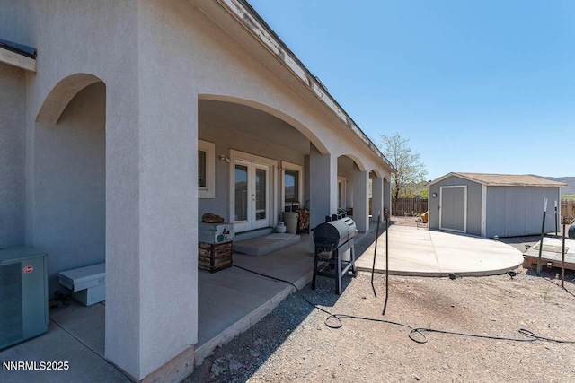 4945 Broken Spur Rd, Reno, NV 89510 - view of patio with french doors and grilling area