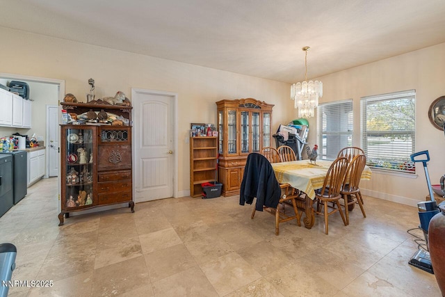 4945 Broken Spur Rd, Reno, NV 89510 - dining room with a chandelier and baseboards
