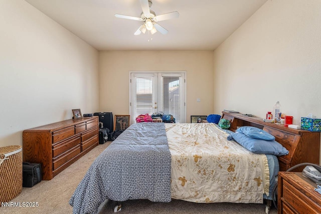 4945 Broken Spur Rd, Reno, NV 89510 - bedroom with light carpet, french doors, access to exterior, and ceiling fan