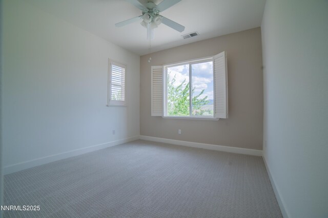 8270 Antler Pointe Ct, Reno, NV 89523 - spare room with light colored carpet and a ceiling fan