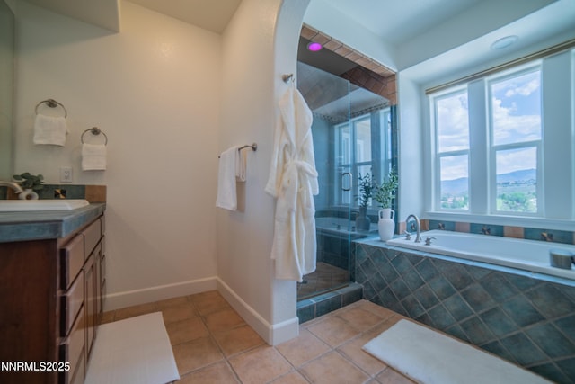 8270 Antler Pointe Ct, Reno, NV 89523 - full bath featuring a garden tub, vanity, a shower stall, and tile patterned floors