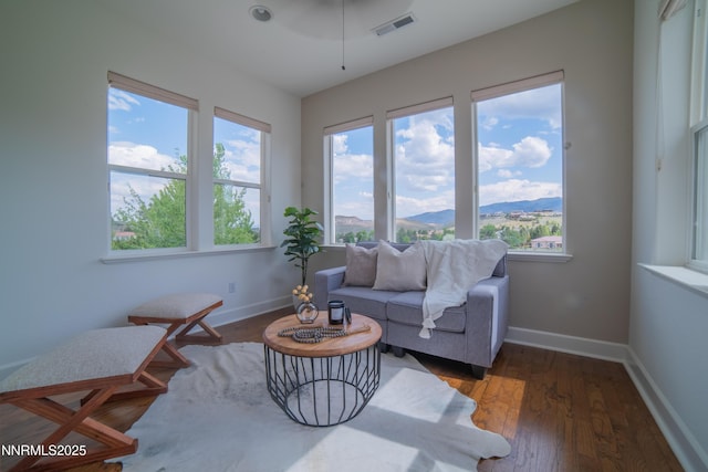 8270 Antler Pointe Ct, Reno, NV 89523 - sunroom / solarium featuring healthy amount of natural light, wood finished floors, and a mountain view