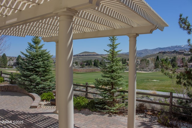 8270 Antler Pointe Ct, Reno, NV 89523 - view of patio / terrace with a pergola, a mountain view, and view of golf course