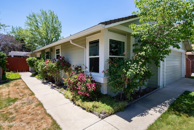 3353 Alpland Ln, Sparks, NV 89434 - view of side of home with an attached garage