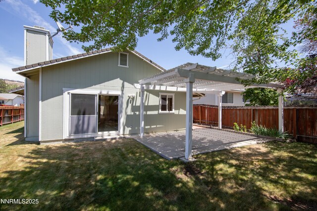 3353 Alpland Ln, Sparks, NV 89434 - rear view of property featuring a pergola, a chimney, and a patio area