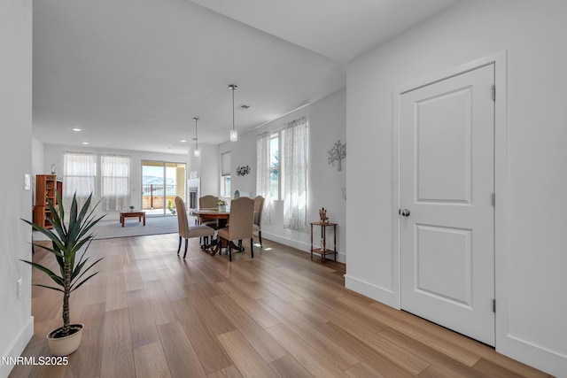 353 Radiant Dr, Carson City, NV 89705 - dining room with plenty of natural light, light wood-style floors, recessed lighting, and baseboards