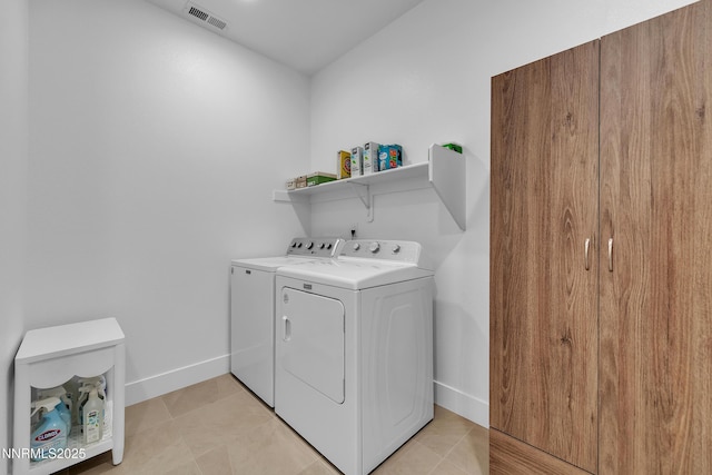 353 Radiant Dr, Carson City, NV 89705 - washroom with washing machine and dryer, baseboards, and light tile patterned floors