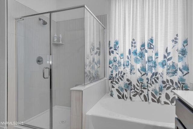 353 Radiant Dr, Carson City, NV 89705 - full bathroom with a stall shower, a bath, and vanity