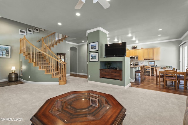 6694 Aston Cir, Sparks, NV 89436 - living room with carpet, arched walkways, recessed lighting, ceiling fan, and stairs