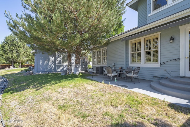 6694 Aston Cir, Sparks, NV 89436 - view of green lawn with a patio area