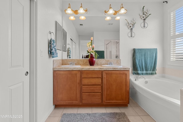 7935 Opal Station Dr, Reno, NV 89506 - full bathroom with a stall shower, tile patterned floors, double vanity, and a bath