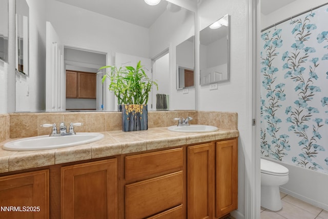 7935 Opal Station Dr, Reno, NV 89506 - bathroom with double vanity, toilet, tile patterned flooring, and shower / bath combo with shower curtain