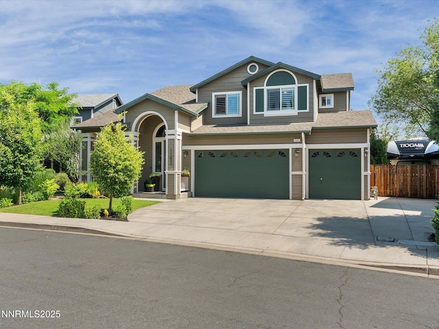 1121 Sageberry Ct, Reno, NV 89509 - view of front of property featuring a garage, driveway, and roof with shingles