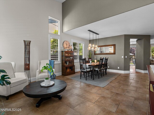 1121 Sageberry Ct, Reno, NV 89509 - dining space featuring a chandelier and baseboards