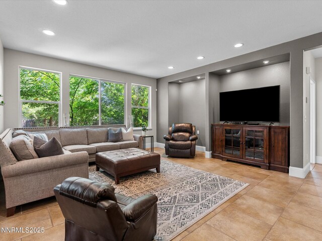 1121 Sageberry Ct, Reno, NV 89509 - living area featuring healthy amount of natural light, recessed lighting, and baseboards