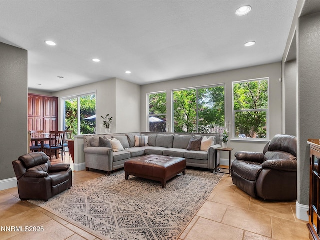 1121 Sageberry Ct, Reno, NV 89509 - living room with recessed lighting and light tile patterned floors