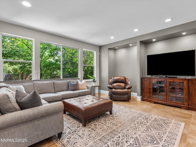 1121 Sageberry Ct, Reno, NV 89509 - tiled living room featuring recessed lighting and baseboards