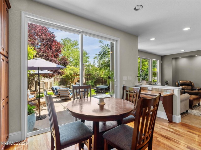 1121 Sageberry Ct, Reno, NV 89509 - dining area with light wood-type flooring, recessed lighting, and baseboards