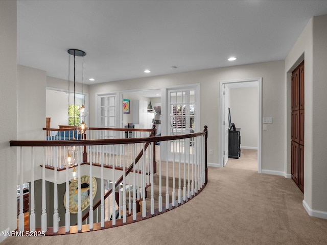 1121 Sageberry Ct, Reno, NV 89509 - hall featuring an upstairs landing, carpet flooring, baseboards, and recessed lighting