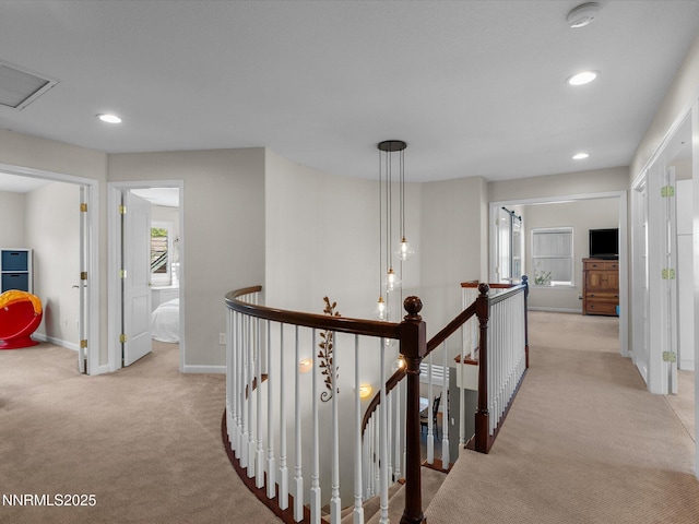 1121 Sageberry Ct, Reno, NV 89509 - hallway featuring an upstairs landing, light colored carpet, baseboards, and recessed lighting