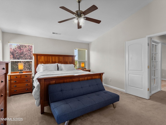 1121 Sageberry Ct, Reno, NV 89509 - bedroom featuring light carpet, lofted ceiling, baseboards, and a ceiling fan