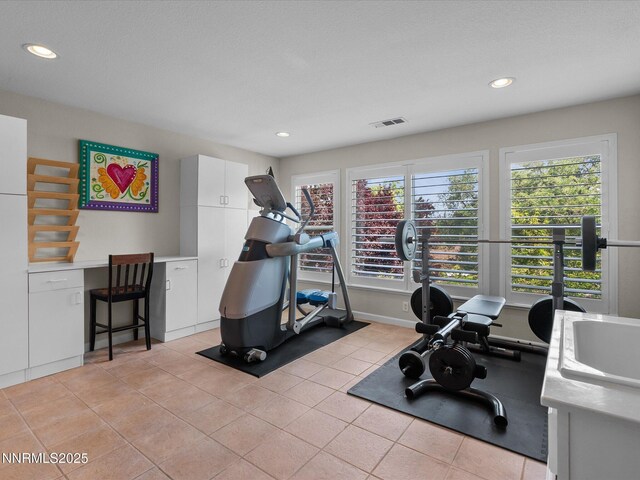 1121 Sageberry Ct, Reno, NV 89509 - exercise room with recessed lighting and light tile patterned floors