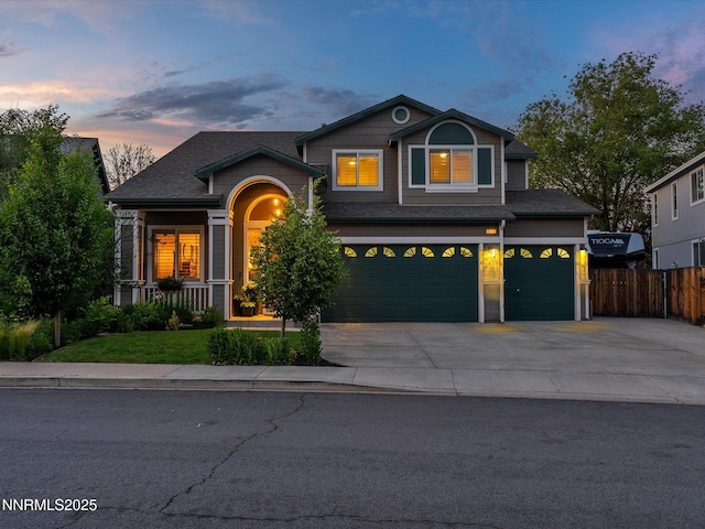 1121 Sageberry Ct, Reno, NV 89509 - traditional-style home featuring a garage, concrete driveway, and roof with shingles