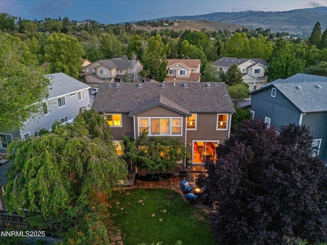 1121 Sageberry Ct, Reno, NV 89509 - rear view of property with roof with shingles, a residential view, and a mountain view