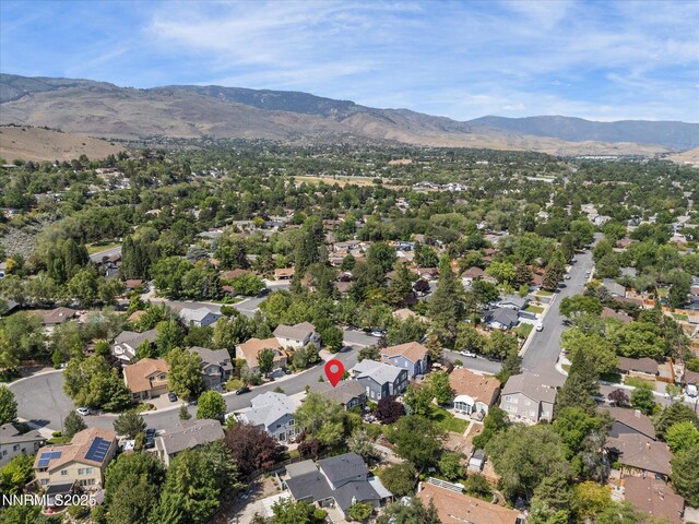 1121 Sageberry Ct, Reno, NV 89509 - aerial perspective of suburban area with a mountainous background