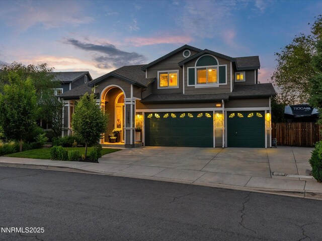 1121 Sageberry Ct, Reno, NV 89509 - view of front of house featuring an attached garage, concrete driveway, and roof with shingles