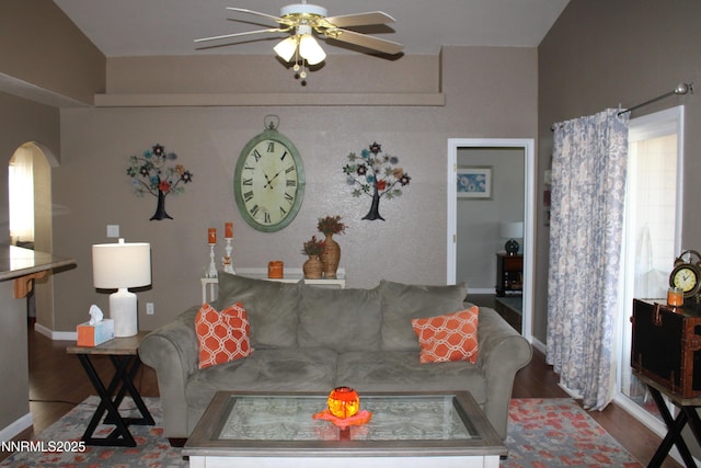 441 Dog Leg Dr, Fernley, NV 89408 - living room featuring a ceiling fan, arched walkways, and wood finished floors