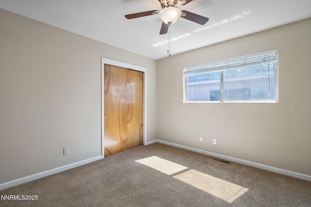423 Bath St, Carson City, NV 89703 - unfurnished bedroom featuring carpet, a closet, and ceiling fan