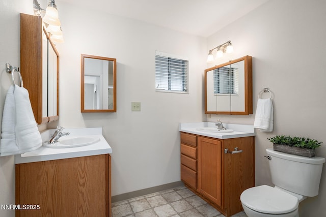 423 Bath St, Carson City, NV 89703 - bathroom featuring vanity and baseboards