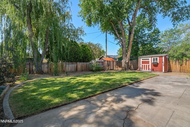 423 Bath St, Carson City, NV 89703 - fenced backyard with a storage unit and a patio area