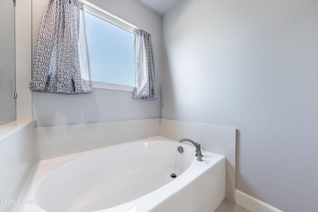 3720 Zoroaster Ct, Sparks, NV 89436 - bathroom with a garden tub and a textured wall