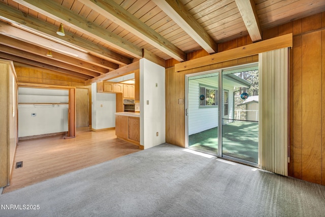 161 Willow Dr, Zephyr Cove, NV 89448 - unfurnished living room featuring wooden walls, light colored carpet, and wooden ceiling