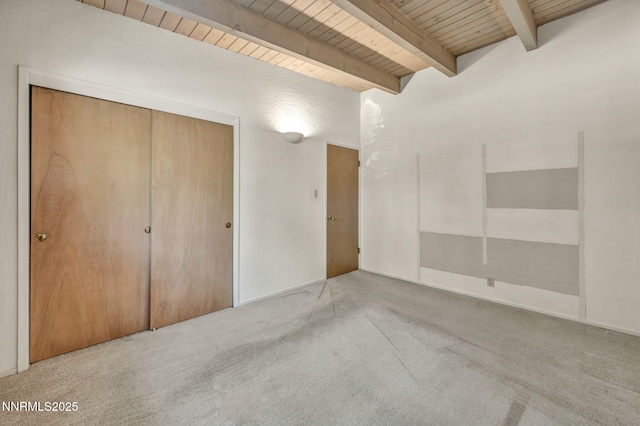 161 Willow Dr, Zephyr Cove, NV 89448 - unfurnished bedroom with carpet floors, a closet, and a wood ceiling with exposed beams