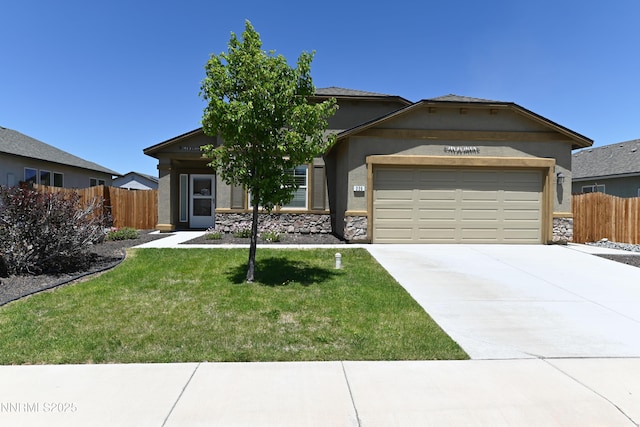 226 Red Oak Dr, Fernley, NV 89408 - view of front facade with a garage, driveway, stucco siding, and stone siding