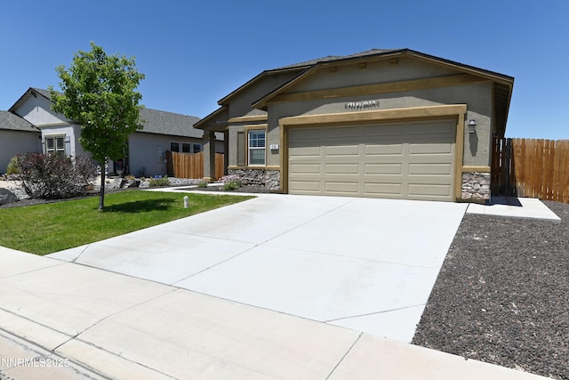 226 Red Oak Dr, Fernley, NV 89408 - single story home featuring stone siding, concrete driveway, an attached garage, and stucco siding