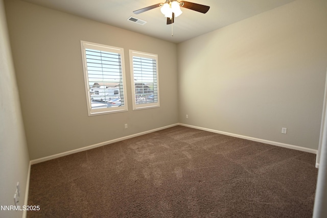 226 Red Oak Dr, Fernley, NV 89408 - spare room featuring ceiling fan and dark colored carpet