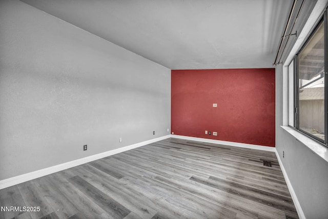 650 E York Way, Sparks, NV 89431 - spare room with wood finished floors and baseboards