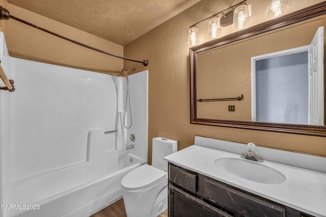 650 E York Way, Sparks, NV 89431 - full bath featuring a textured wall, vanity, tub / shower combination, and wood finished floors