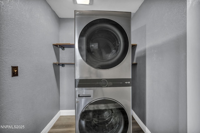 650 E York Way, Sparks, NV 89431 - washroom featuring stacked washer / drying machine, wood finished floors, and a textured wall