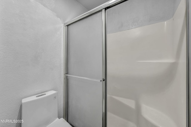 650 E York Way, Sparks, NV 89431 - full bath with a shower with door and a textured wall