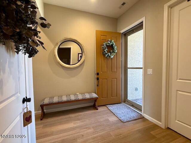 7800 Hoback Dr, Sparks, NV 89436 - foyer entrance featuring light wood-style flooring and baseboards